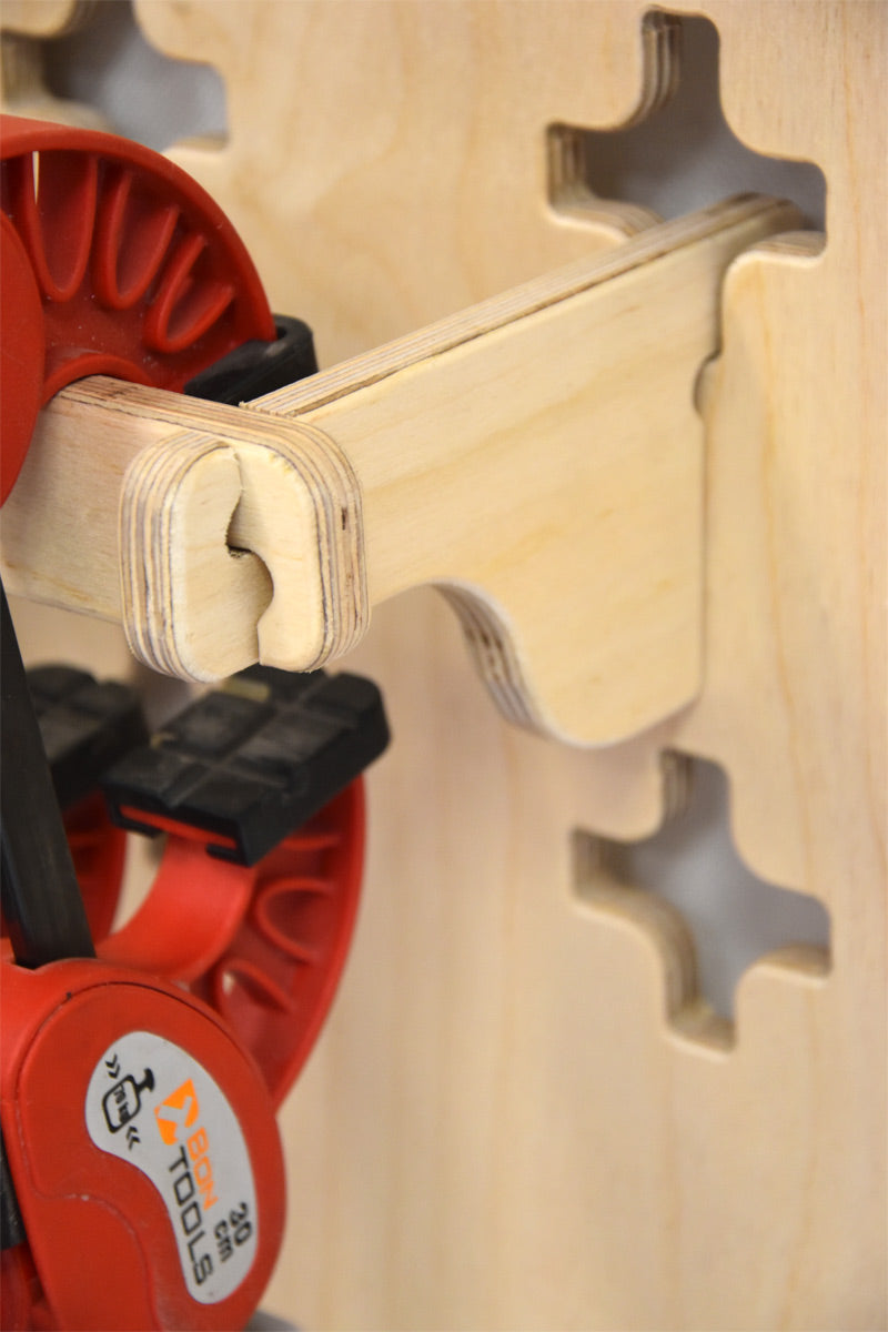 Wall-mounted holder for pliers